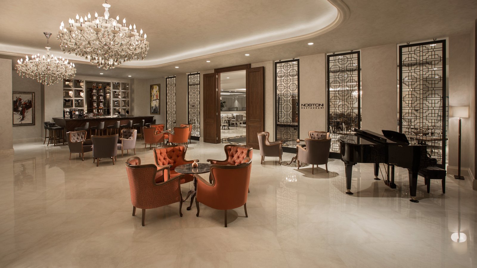 Luxury hotel lobby featuring bespoke contract-grade lounge seating and architectural furniture manufactured for high-traffic hospitality environments
